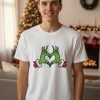 D_959139-MLM97469623377_112025-O.jpg Playera Grinch Corazon Navidad